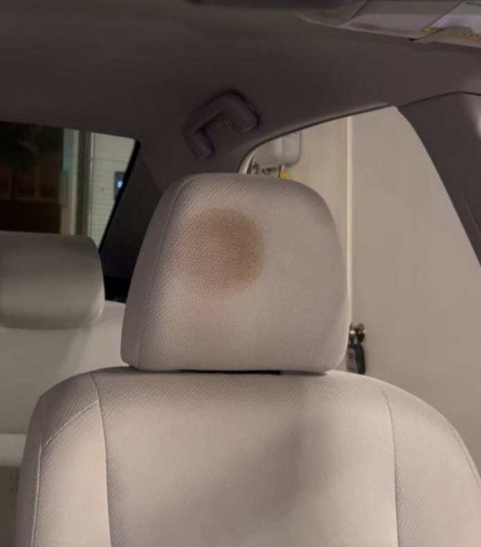 Headrest stain - before interior detail